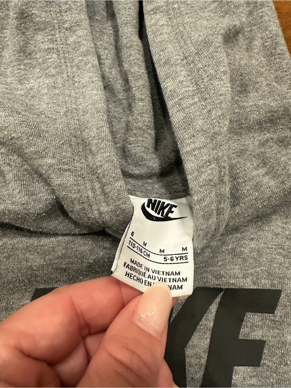 Nike Youth Gray Pullover Hoodie with Black Logo and White Swoosh
